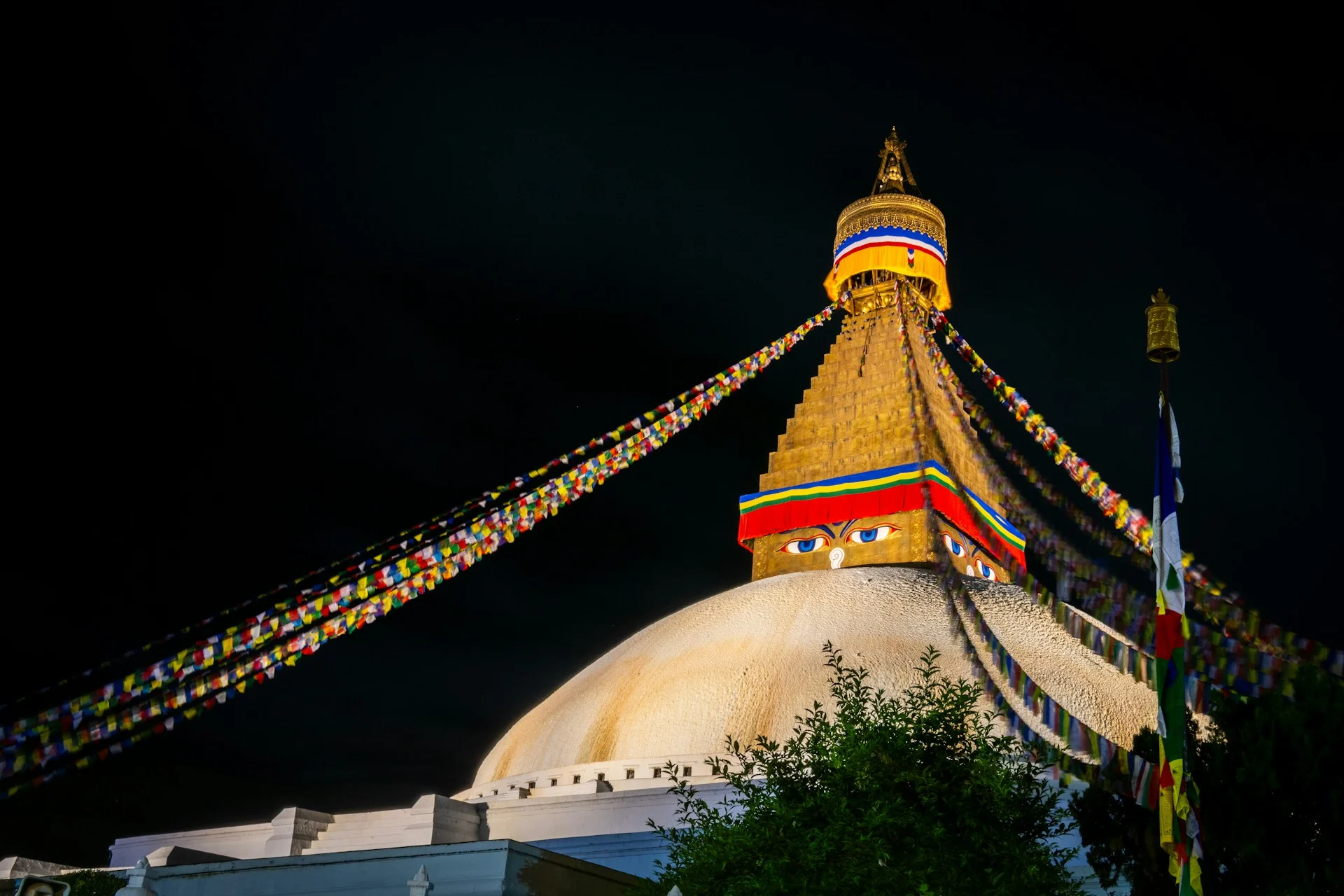 Boudhanath Stupa illuminated at night in Kathmandu